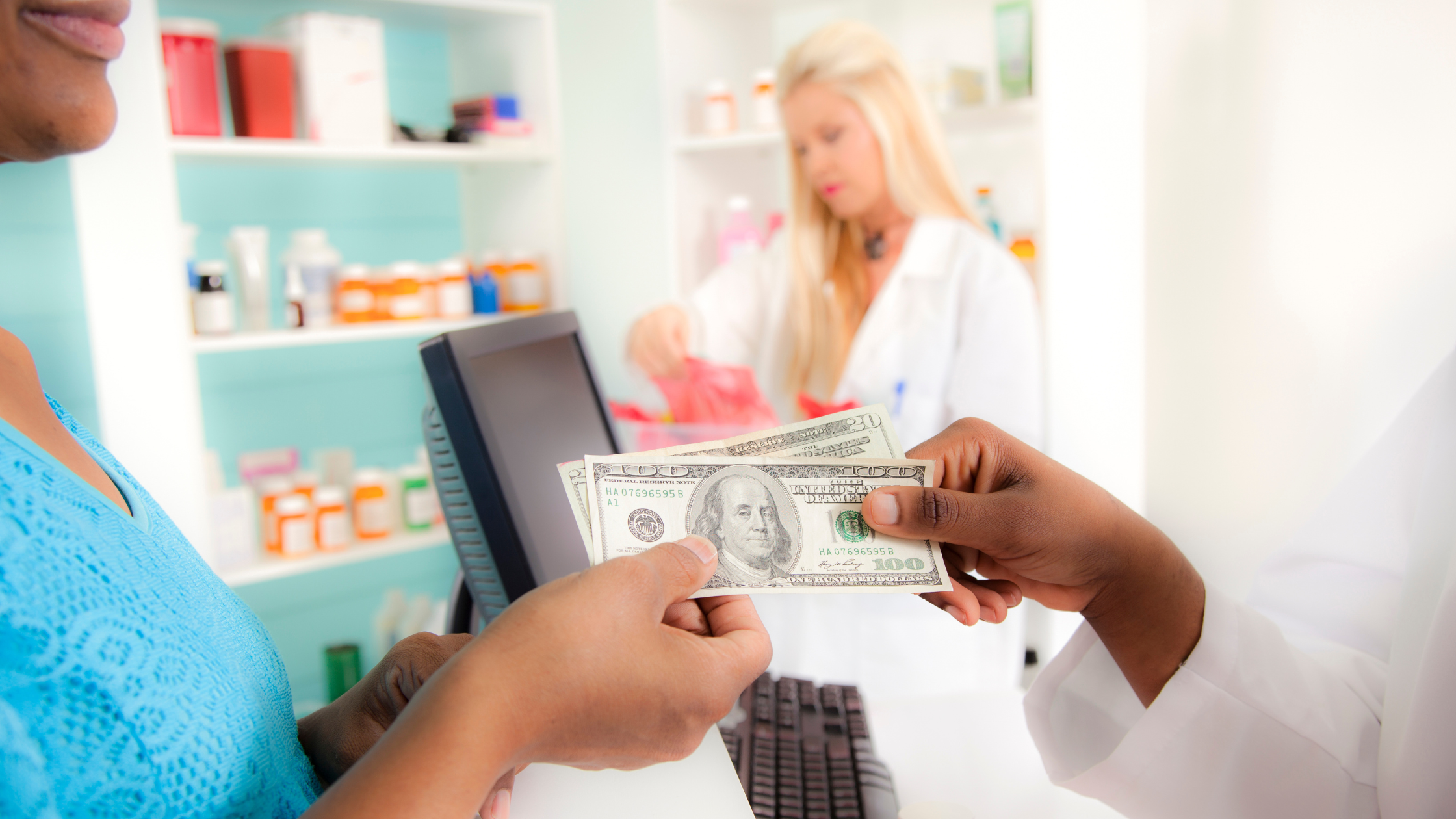 Patient paying for prescription at pharmacy counter, illustrating the financial burden of treatment and the need for co-pay relief for chronic illness care.